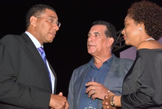 Prime Minister, the Most Hon. Andrew Holness (left), in discussion with Attorney General, Marlene Malahoo Forte and Mayor of Montego Bay, His Worship Homer Davis, at the opening of Breathless Montego Bay Resort and Spa in Freeport, St. James, on September 25. 