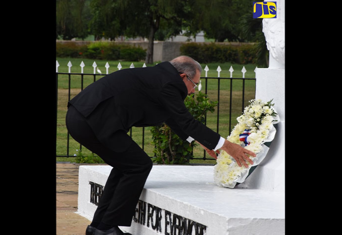 President of the Dominican Republic Lays Flowers to Remember War Dead