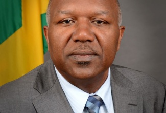 The Honourable Dr. Morais Guy, M.P. Transport, Works and Housing