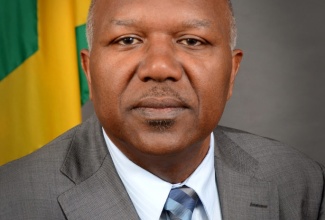 Minister Without Portfolio (Housing) in the Ministry of Transport, Works and Housing, Hon. Dr. Morais Guy