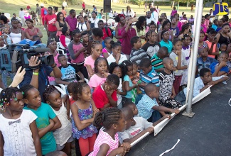 
A section of the large group of children who turned out for the Christmas Concert and gifts at the Old Hospital Park on Gloucester Avenue, Montego Bay, on December 25. 
