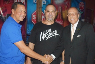 (Right) Ali McNab, Special Advisor to the Minister of Culture, Gender, Entertainment and Sport greets  Michael Mair (left) and Andrew Alexander, owner of Truck Stop at the recent Media Launch for the Port Antonio International Marlin Tournament in Kingston.