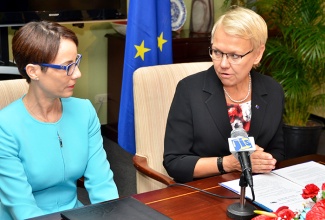 Foreign Affairs and Foreign Trade Minister, Senator the Hon. Kamina Johnson Smith (left), listens to a point being made by Head of the European Union (EU) Delegation in Jamaica, Ambassador Malgorzata Wasilewska, during the Third Jamaica/EU Political Dialogue held recently at the Ministry’s New Kingston offices.
 
