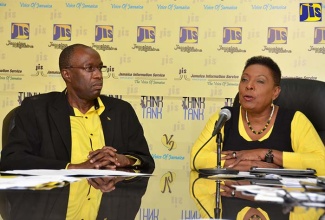 The late Executive Director of the Jamaica Cultural Development Commission, Dr. Delroy Gordon is pictured here in the company of Culture Minister, Hon. Olivia Grange. The two were guests at a JIS Think Tank session last year. Dr Gordon passed away suddenly this morning.