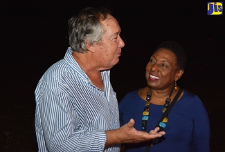 
Minister of Culture, Entertainment, Gender and Sport, Hon. Olivia Grange (Right),  sharing a light moment with 
Custos of Trelawny, Paul Muschett, on October 16 at a reception at the Melia Braco Hotel in honour of Jamaica's Olympic athletes.
