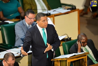 Prime Minister the Most. Hon. Andrew Holness (2nd right), emphasises a point during his contribution to the 2017/18 Budget Debate in the House of Representatives on Tuesday, March 21. 