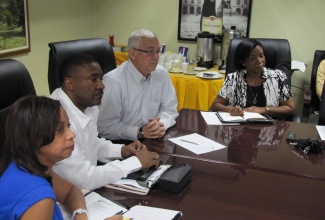 Minister of State in the Ministry of Science,  Technology, Energy and Mining, Hon. Julian Robinson, making his  contribution to the 2013/14 Sectoral Debate in the House of Representatives on May 28.
