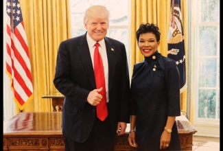 United States President, Donald Trump, gives Jamaica the ‘thumbs up’ as he shares a light moment with Jamaica’s Ambassador to the United States, Her Excellency Audrey Marks, in the Oval Office, during her recent courtesy call at the White House.