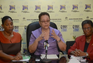 Executive Director of the Jamaican Association on Intellectual Disabilities, Christine Rodriguez (centre), addresses JIS ‘Think Tank’, yesterday (March 29).  Others (from left) are:  Development Manager, Marilyn McKoy (left) and President, Sonia Jackson.