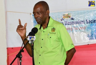 Minister without Portfolio in the Ministry of Industry, Commerce, Agriculture and Fisheries, Hon. J.C. Hutchinson, addresses members of the Seville Benevolent Society Production and Marketing Organization (PMO) at a meeting at the Fantasy Beach in Priory, St. Ann, on Friday (October 21). 