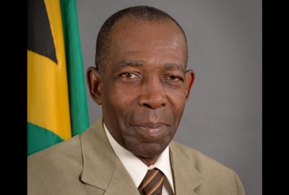 Minister of State in the Ministry of Science, Energy, Telecommunications and Transport J. C. Hutchinson