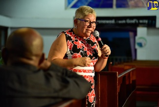 Chief Technical Director for the Planning, Monitoring and Evaluation Division, Office of the Prime Minister (OPM), Jacqueline Lynch-Stewart, makes  her presentation on the National Identification System (NIDS) on Thursday, March 1, at a public forum at the Webster Memorial United Church in St. Andrew. The forum was one of several public education initiatives being spearheaded by the OPM on the system. 