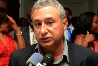President of the Jamaica Manufacturers’ Association (JMA), Metry Seaga, offers his views on the Prime Minister’s 2016/17  budget presentation, during a post budget debate reception at Vale Royal in St. Andrew, on May 24.
