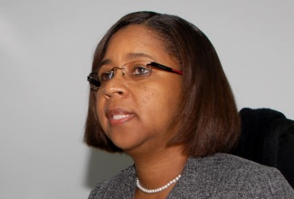 Climate Change Adaptation and Disaster Risk Reduction Project Manager, Planning Institute of Jamaica (PIOJ), Mrs. Mary-Ann Gooden, telling JIS News about the RiVAMP project in Negril.