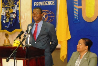 State Minister for Foreign Affairs and Foreign Trade, Hon. Arlando Brown (left), addresses a special meeting to mark the 100th anniversary of Kiwanis International, held on Wednesday (January 14), at the Wexford Hotel in the St. James capital.
Looking on at right is the Lieutenant Governor for Kiwanis International’s Division 25, Lisa Golding. 