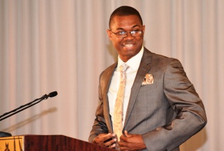 State Minister in the Ministry of Foreign Affairs and Foreign Trade, Hon. Arnaldo Brown, addresses the opening ceremony for the 6th Biennial Jamaica Diaspora Conference on June 14, at the Hilton Rose Hall Resort, where he gave a report on the work of the Jamaica Diaspora Advisory Board. 