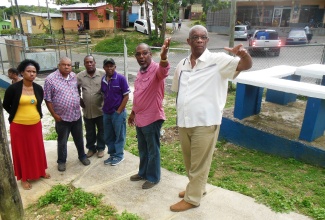 State Minister for Agriculture and Fisheries, Hon. Luther Buchanan (2nd right), leads the discussion with members of the Rural Community Development Task Force on how Bethel Town in Westmoreland can become a model community. The group also toured Stetin in Trelawny on December 13 to get firsthand knowledge of the communities.