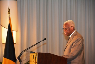 Minister of Foreign Affairs and Foreign Trade, Senator the Hon. A. J. Nicholson, addresses the opening of the 6th Jamaica Diaspora Conference on Sunday (June 14) at the Hilton Rose Hall Resort in Montego Bay. 