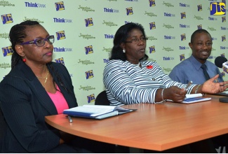 Acting Principal of the Montego Bay Community College, Dr. Maureen Nelson (centre), speaking at a JIS ‘Think Tank’ at the agency’s western offices in Montego Bay, St. James, on November 7.  With Dr. Nelson are (from left): the College’s Dean of Workforce Development and Continuing Studies, Mrs. Karen Gayle and the Director of Marketing and Public Relations, Mr. Ruiz Warren.