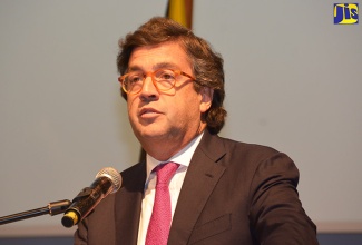 President of the Inter-American Development Bank (IDB) Luis Alberto Moreno, addresses the 19th staging of the Forum for Markets Innovation and Capital (FOROMIC) at the Montego Bay Convention Centre in Rose Hall, St. James, on October 24.