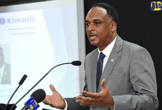 Jamaica Social Investment Fund Managing Director, Omar Sweeney, addresses the Kiwanis Club of Barbican’s third anniversary meeting at the Betting, Gaming and Lotteries Commission’s offices on Hagley Park Road in Kingston on Tuesday (January 16). 