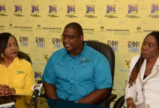 Executive Director of the Scientific Research Council (SRC), Dr. Cliff Riley (centre), addresses JIS ‘Think Tank’, on  January 26. Others (from left) are:  General Manager, Marketing and Corporate Communications, at the SRC, Roselyn Fisher and  Manager, Process Development, Julia Brown. Dr. Riley  spoke of  the  SRC’s two new patented systems to be used to produce artemia fish feed.