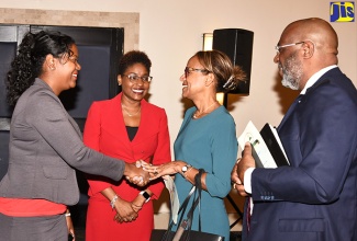 Auditor General, Pamela Monroe Ellis (second left) introduces General Manager of the Inter-American Development Bank (IDB) Country Department, Therese Turner-Jones (second right), to Chairperson of the Caribbean Organisation of Supreme Audit Institution (CAROSAI), Charmain Felter (left), at the 30th anniversary conference launch of CAROSAI at The Jamaica Pegasus hotel in New Kingston on April 16. Looking on (at right) is President of the Institute of Chartered Accountants of the Caribbean (ICAC), Anthony Pierre.