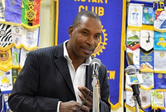 Medical Chief of Staff and Consultant Neurosurgeon at the University Hospital of the West Indies Dr. Carl Bruce addresses a recent meeting of the Rotary Club of St. Andrew North 