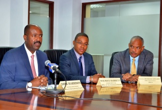 Contractor General, Dirk Harrison (left) responds to questions in an interview with JIS News on Friday (April 21), while Senior Director in the Office of the Contractor General (OCG), Maurice Barrett (centre) and Director General, Major and Organized Crime and Anti-Corruption Agency (MOCA), Colonel Desmond Edwards (right) look on. The OCG is spearheading Jamaica’s staging of the Commonwealth Caribbean Association of Integrity Commissions and Anti-Corruption Bodies (CCAICACB) Conference from April 24 to 28 at the Jamaica Pegasus Hotel in Kingston. The Conference, to involve high-level local, regional and international participation, is to be held under the theme ‘The Anti-Corruption Agenda – Today, Tomorrow, the Region and Beyond’.