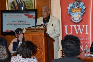 Minister of Water, Land, Environment and Climate Change, Hon. Robert Pickersgill, delivers the keynote address at the media launch of the University of the West Indies (UWI) Mona Research Days 2015, held on January 20 at the St. Andrew campus.