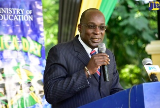 Minister of Education, Youth and Information, Senator the Hon. Ruel Reid, giving the keynote address at the launch of Jamaica Day 2018, on January 24 at the Hope Botanical Gardens, in Kingston.