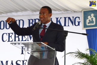 Chairman of the National Housing Trust (NHT), Ambassador Dr. Nigel Clarke, speaking recently in Westmoreland where ground was broken for the construction of two housing developments. 