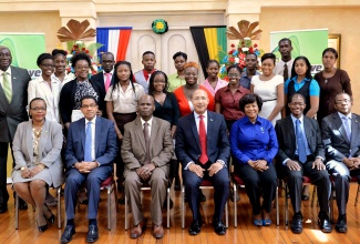 Governor General, His Excellency, the Most Hon. Sir Patrick Allen (seated  centre) and Her Excellency the Most Hon. Lady Patricia Allen (seated third right) share a photo with university and college students, who are recipients of scholarships and book grants under the Governor General’s I Believe Initiative. The award ceremony was held at King’s House on Friday (Sept. 11). Others (seated, from left) are: Project Officer for the Governor General’s Programme for Excellence (GGPE), Tricia Grier; Chief Executive Officer (CEO), Kingston Wharves, Grantley Stephenson; Custos of Kingston, Hon. Steadman Fuller; Acting President of the University of Technology (UTech), Professor Colin Gyles; and CEO of First Global Bank, Courtney Campbell. Coordinator of the GGPE, Retired Major Effiom Whyte, is also sharing in the moment (first left, second row).