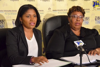 Manager for Public-Private Partnership at the National Education Trust (NET), Latoya Harris (left), provides details about the work of the Trust during a recent JIS Think Tank.  At right is Managing Director of NET,  Marcia Phillips Dawkins.
