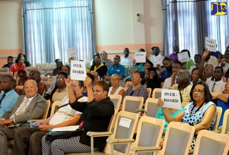 Principal Director of Culture and Creative Industries in the Policy Division of the Ministry of Culture, Gender, Entertainment and Sport, Dr. Janice Lindsay (right, front row) joins participants in a lecture to commemorate the 235th Zong massacre of African slaves, at the Institute of Jamaica on Thursday, December 22. Dr. Lindsay delivered remarks on behalf of Portfolio Minister, Hon. Olivia Grange. The audience was participating in a presentation being delivered by Political Ombudsman,  Mrs. Donna Parchment Brown.