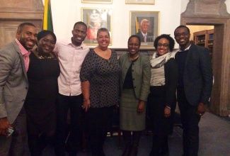 Jamaica's High Commissioner to London, Her Excellency Aloun Ndombet-Assamba (Centre) and Deputy High Commissioner Mrs. Deidre Mills (third right) share a photo opportunity with five of 2015/16 Jamaican Chevening Scholars during a courtesy call at the Jamaican High Commission in London on Thursday November 5 2015. The Chevening Scholars from left are: Adley Duncan, Chadine Ellis, Jerome Cowans, Grace Lindo and Oroyo Eubanks.