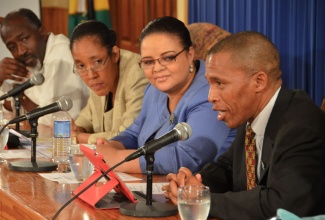 Minister with Responsibility for Information, Senator the Hon. Sandrea Falconer (2nd right), Chief Executive Officer of the Jamaica Information Service (JIS), Donna-Marie Rowe and Press Secretary at the Office of the Prime Minister, Lincoln Robinson listen keenly to Botswana’s Deputy Permanent Secretary, Ministry of State President, Mogomotsi Kaboeamodimo (right) as he explains the objective of the Botswana Benchmarking Programme at the Special Meeting of Government Communicators held on September 18 at the Office of the Prime Minister.