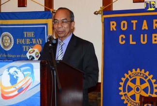 Minister without Portfolio in the Ministry of Economic Growth and Job Creation, Hon. Dr. Horace Chang, addresses a Rotary Club of St. Andrew luncheon meeting, held at the Hotel Four Seasons on March 28.