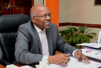 Minister with responsibility for Housing in the Ministry of Transport Works and Housing, Hon. Dr. Morais Guy, during an interview with JIS News.