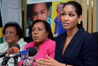 Minister of Youth and Culture, Hon. Lisa Hanna (right), (from left): Acting Chief Executive Officer, Child Development Agency, Rosalee Gage-Grey; and Children’s Adviser in the Ministry, Sadie Keating. FILE