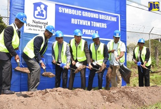 Prime Minister, the Most Hon. Andrew Holness (centre), breaks ground for the National Housing Trust’s (NHT) $4.1 billion Ruthven Towers housing development on Ruthven Road in St. Andrew, on September 22. Also participating in the exercise (from left) are: Custos Rotulorum for Kingston, Hon. Steadman Fuller; NHT Managing Director, Martin Miller; Minister without Portfolio in the Ministry of Economic Growth and Job Creation, Hon. Dr. Horace Chang; NHT Chairman, Ambassador Dr. Nigel Clarke; Member of Parliament for South East St. Andrew, where the project is located, Julian Robinson; and Custos Rotulorum for St Andrew, Hon. Patricia Dunwell.