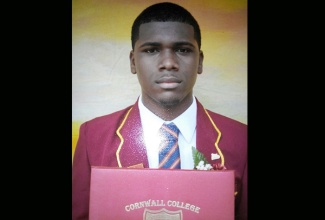 Seventeen-year-old, Matthew Harvey, displays his high school diploma at his graduation from Cornwall College in July. Matthew holds seven Grade Ones and two Grade Twos in nine subjects at the Caribbean Secondary Examination Certificate (CSEC) level and dreams of one day becoming a Paediatrician.