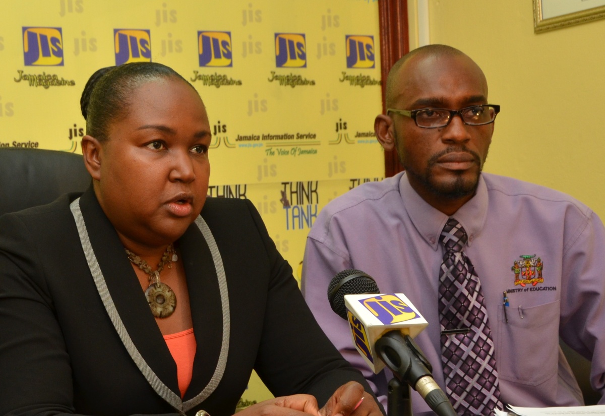 Chief Education Officer in the Ministry of Education, Dr. Grace McLean, addresses a JIS Think Tank on Tuesday, August 25. At right is Director of Technical Services in the Ministry, Carey Brown. 