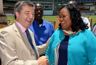 Minister with Responsibility for Sport, Hon. Natalie Neita Headley (right), shares a light moment with Senior Vice President of Philips, Laurent de Bray (left), during her visit to Sabina Park in Kingston on Thursday (July 17) to view the progress of work on the US$2.7 million floodlight installation project. Philips is supplying the floodlights to be installed at the park.