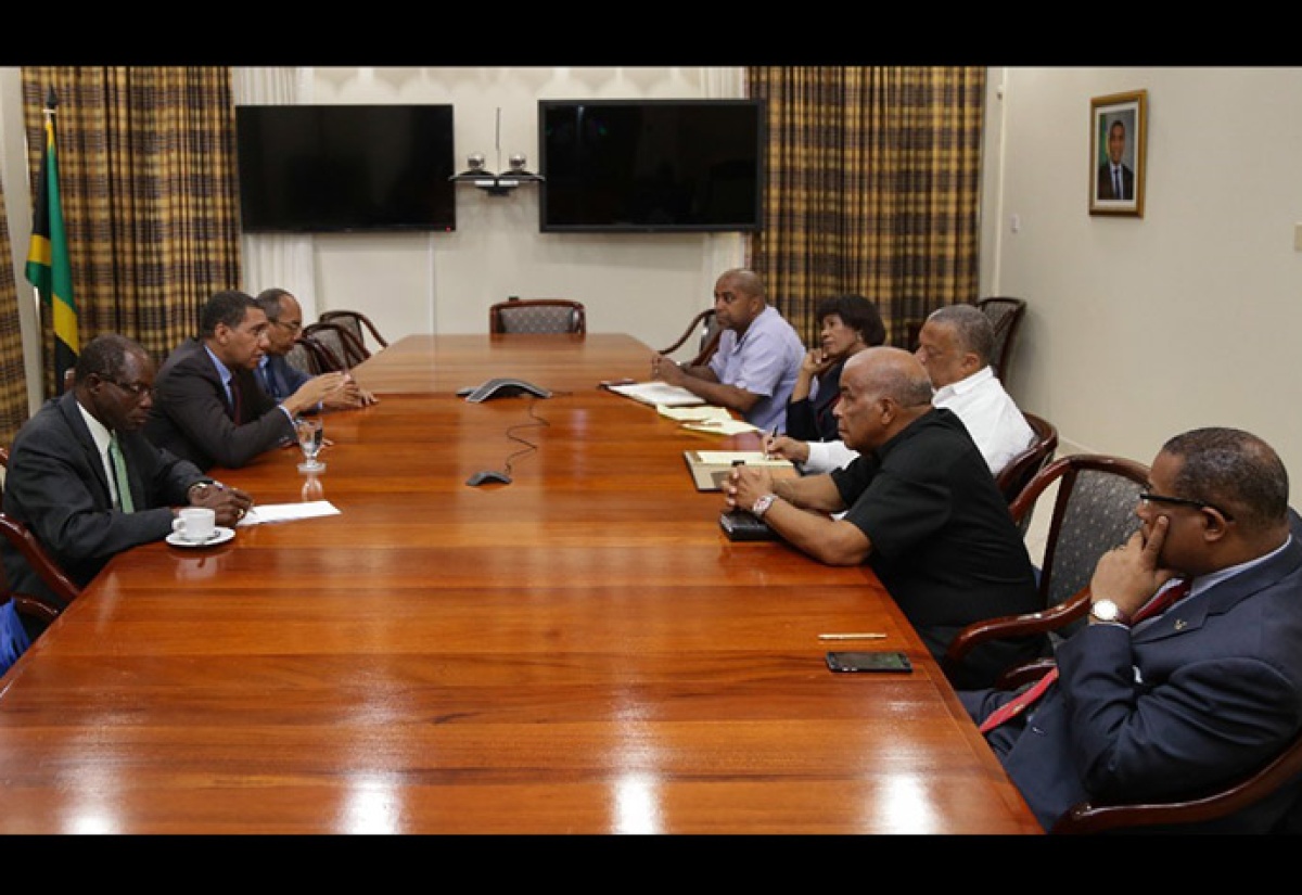 Government and Opposition members at a meeting on Tuesday.