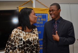 State Minister for Foreign Affairs and Foreign Trade, Hon Arnaldo Brown (right), engages Vice President, Trafalgar New Heights Rotary Club, Kerry Spencer, in discussion during the club’s weekly meeting at CRU Bar Complex, Lady Musgrave Road, St. Andrew, on January 15, where he addressed matters pertaining to the recently announced re-establishment of diplomatic relations between the United States of America, and Cuba.