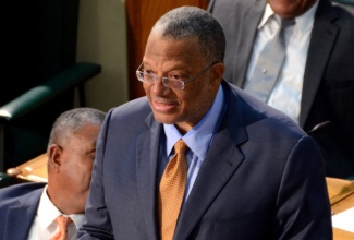 Minister of Finance and Planning, Dr. the Hon. Peter Phillips, opens the 2015/16 budget debate in the House of Representatives on Thursday, March 12.  His presentation was done under the theme: ‘Strong Foundations for Growth  and the Expansion of Opportunities’.