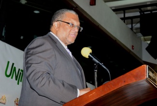 Minister of Finance and Planning, Hon. Dr. Peter Phillips, delivers the keynote address at the ‘Unite for Change’ National Forum on Youth Violence Prevention, which was held on January 30 at the Jamaica Conference Centre, downtown Kingston.