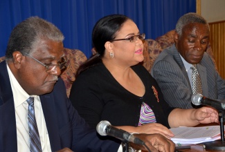 Minister with responsibility for Information, Senator the Hon. Sandrea Falconer (centre), addresses a Jamaica House media briefing at the Office of the Prime Minister on Wednesday (November 11). She is flanked by Chairman of the Electricity Sector Enterprise Team (ESET), Dr. Vincent Lawrence (left), and ESET Board member, Professor Alvin Wint.