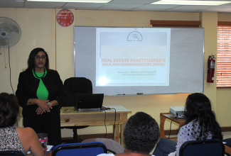 Chief Executive Officer of the Real Estate Board, Sandra Watson-Garrick,  conducts a training session at the Real Estate Training Institute